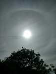 Rain bow round the sun.