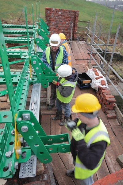 10 - Adding the side pieces to the Meccano bridge deck
